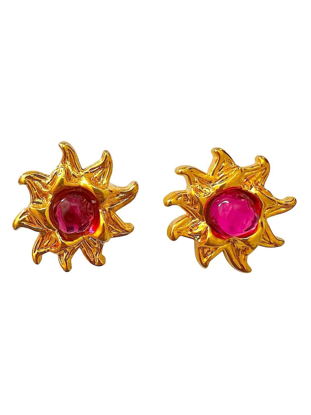 Gold sunburst clip on earrings.
